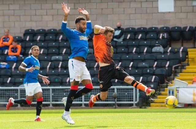 Robson Slots It Past The Goalkeeper As Rangers Defenders, Tavernier And Goldson Watch On.