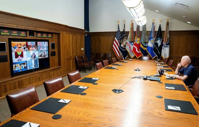 Joe Biden in a video meeting with Kamala Harris, their security team about the situation in Afghanistan
