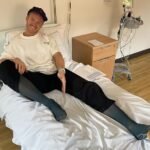 O noivo de Greg Rutherford divulgou uma atualização sobre a recuperação da cirurgia do ex-atleta olímpico no Instagram na quinta-feira, depois que ele 'rasgou todo o abdômen' na manhã da final do Dancing On Ice (Greg foi fotografado após a cirurgia na semana passada)
